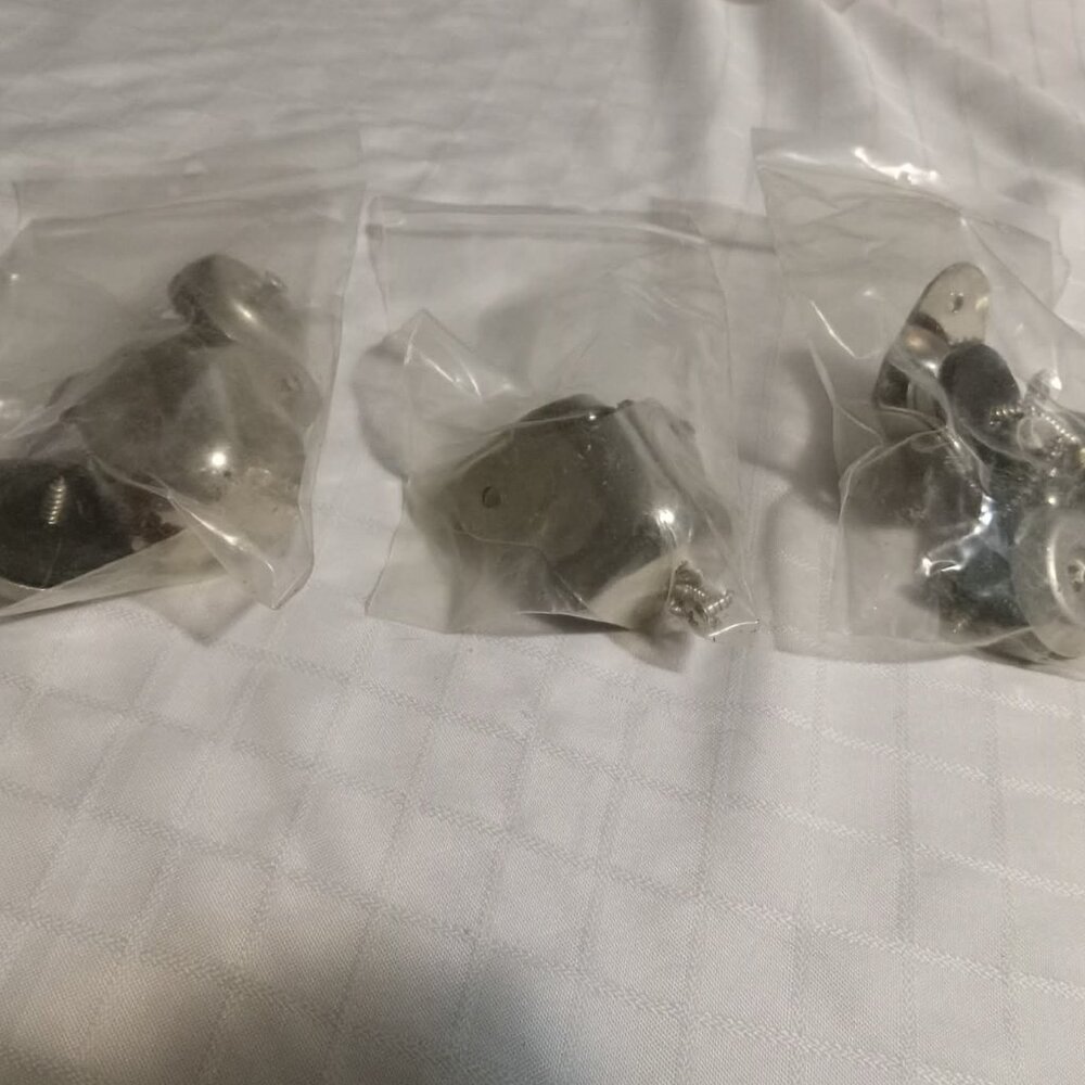 4 vintage metal corner furniture protectors, new, in packaging